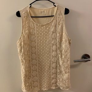 Open knit front, fabric back, cream tank top